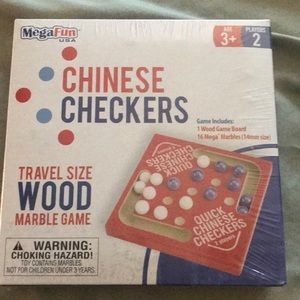 A wooden travel Chinese checkers game